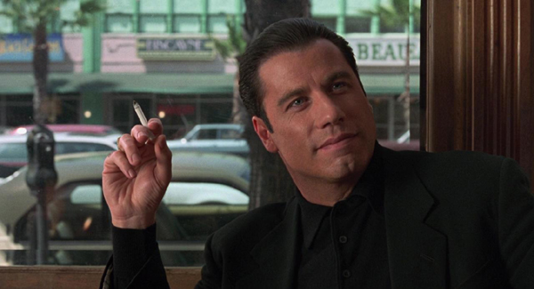 John Travolta as Chili Palmer in Get Shorty